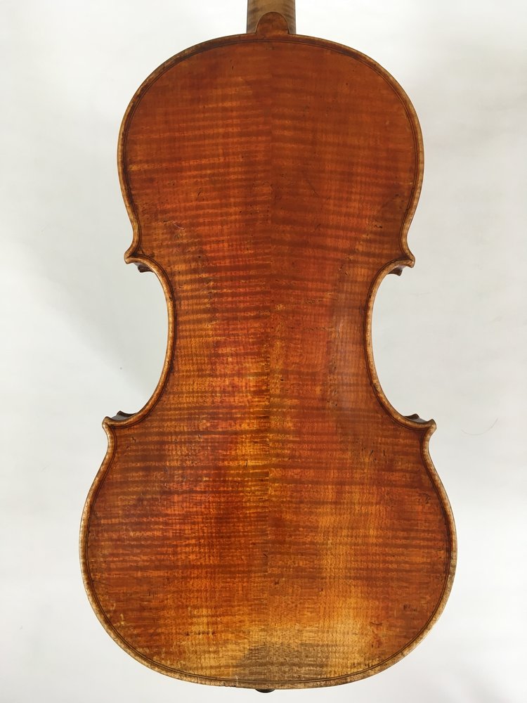 Image of the rear of a violin