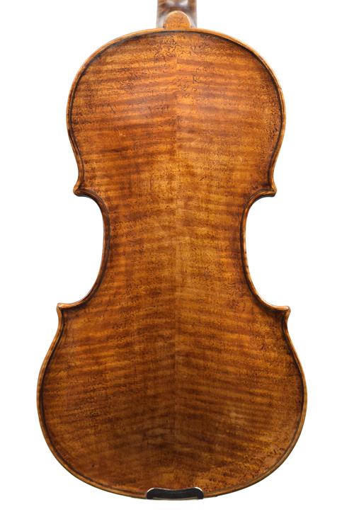 Image shows the back of the Saxon violin with a...