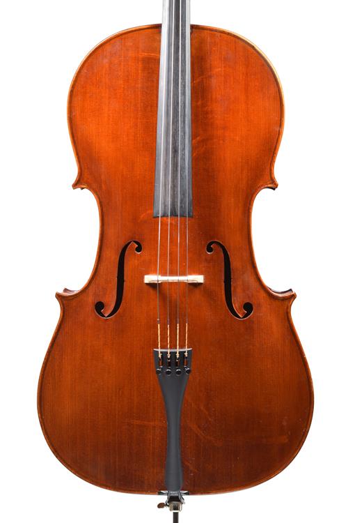 Front of Lawrence Cocker cello showing bear cla...