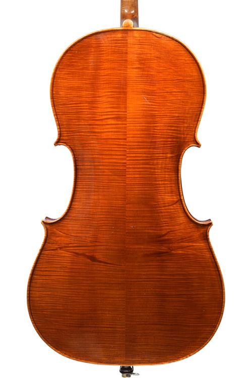 Back of cello by Cocker showing two pieces of m...